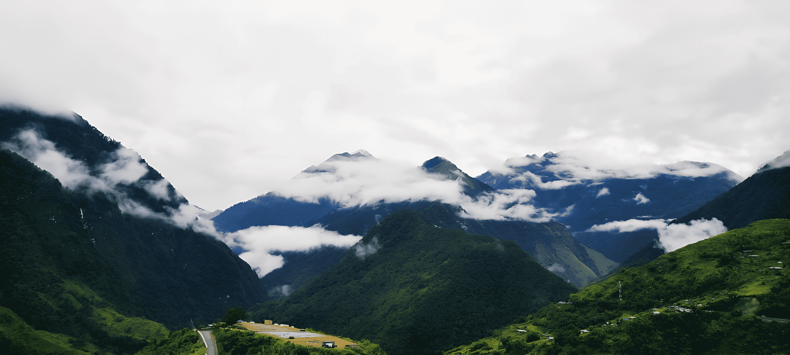 Homestay cabins surrounded by hills